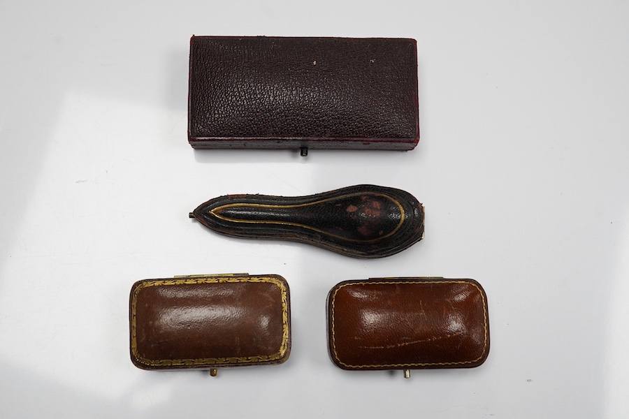 A group of gentleman's accessories, early 20th century, comprising: two pairs of cultured pearl collar studs, one set marked 15CT, each with fitted cases; a stick pin topped with the head of a fox, indistinct mark to pin